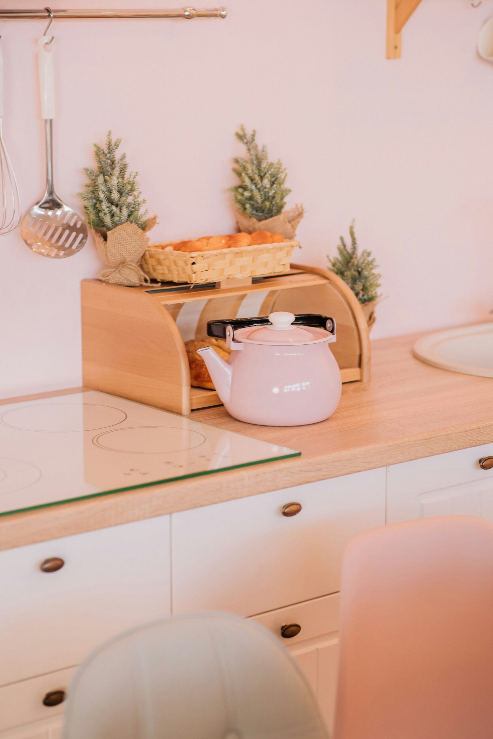 A Click and Grow Smart Garden and an AeroGarden side by side on a kitchen counter